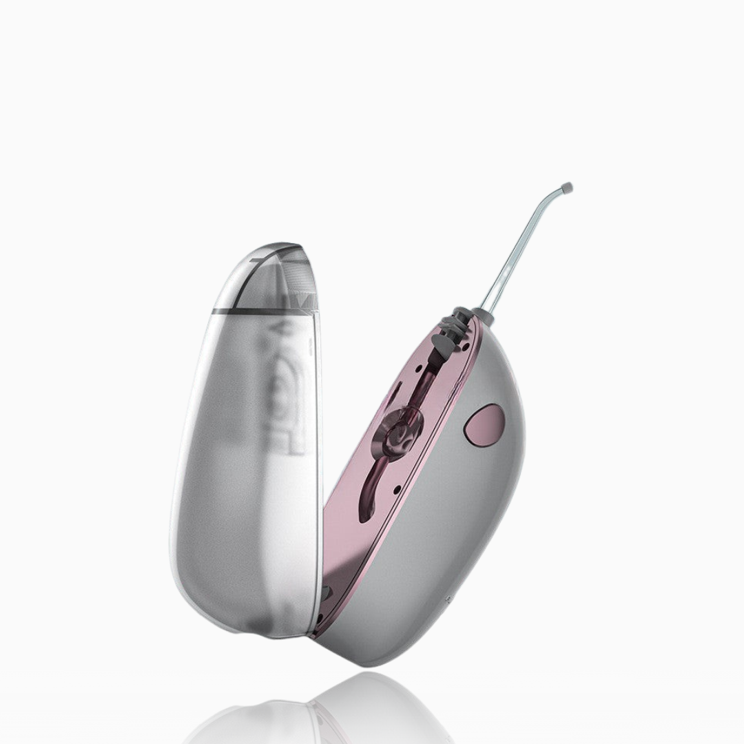 Portable Electric Flosser removing plaque effortlessly.