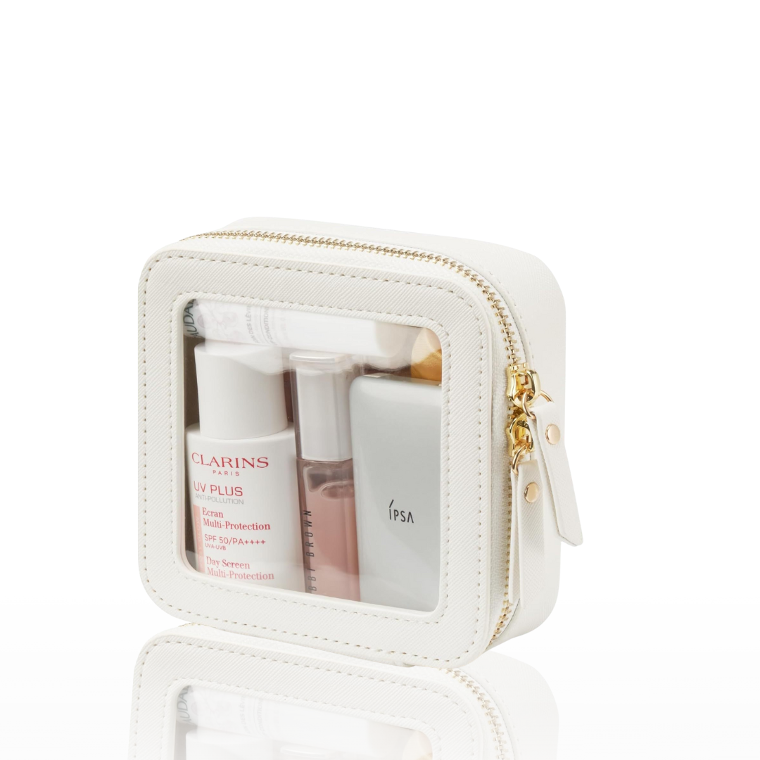 Transparent PU cosmetics bag with visible toiletries, ideal for travel and daily use.