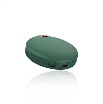 LUMi multifunctional hand warmer, cosmetic mirror, and power bank in green.