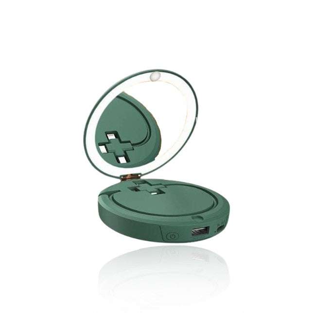 LUMi multifunctional hand warmer with mirror and powerbank in green.