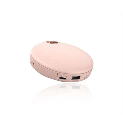 Multifunctional LUMi hand warmer, cosmetic mirror, and power bank in compact design.