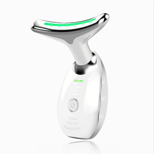 Multifunctional ION+ skincare massager in white with LED lights for anti-aging benefits.